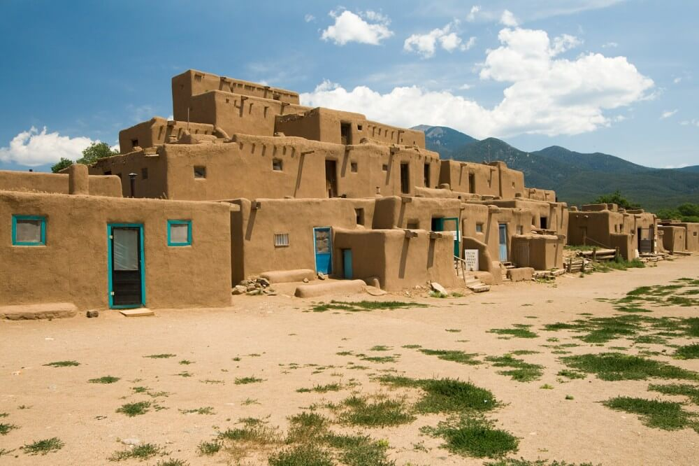 Built sometime between 1000 and 1450 AD, the Taos Pueblo located near modern-day Taos, New Mexico, functioned as a base for the leader Popé during the Pueblo Revolt.